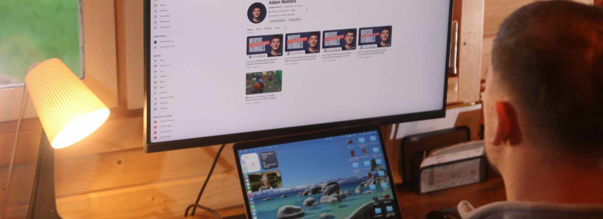 Adam Watters looking at YouTube channel